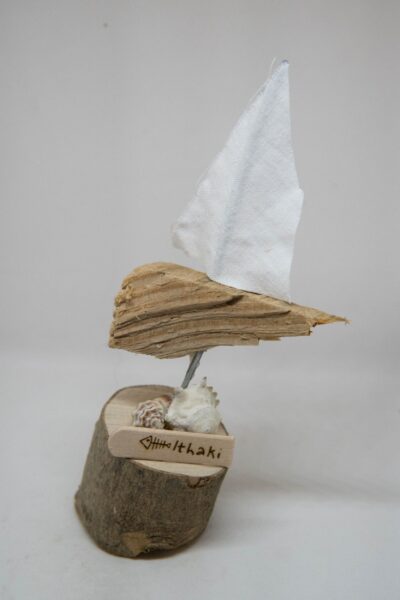 Driftwood Boat with White Sails